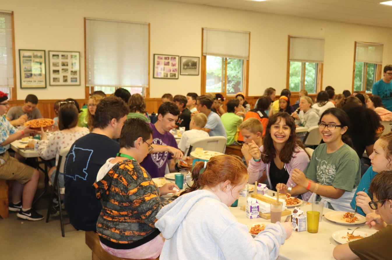 Campers eating in the dining hall